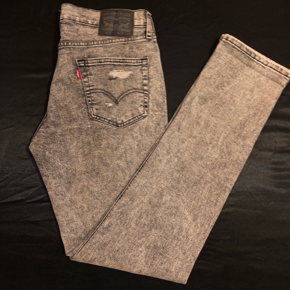 LEVI’S 511 RIPPED JEANS